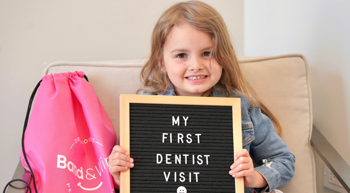 A young child at her first dentist visit in Clarendon Hills, Illinois.