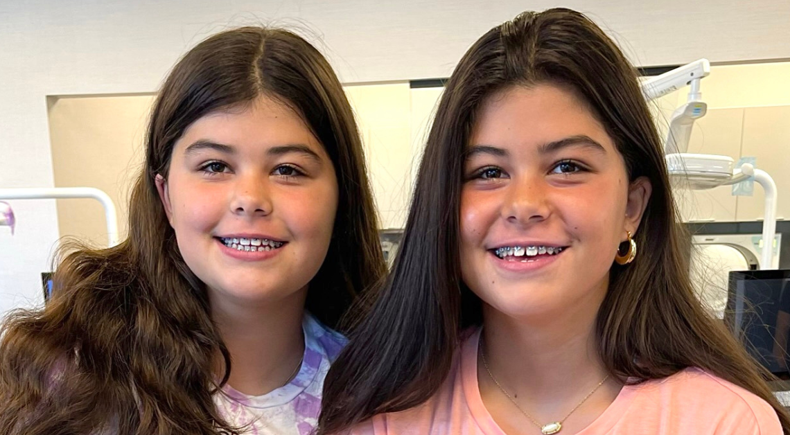 Twins with braces at an orthodontic office near Chicago's West Suburbs.