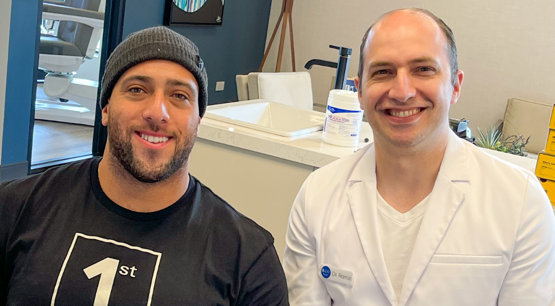 Dr. Ramzi and his adult orthodontic patient in office after a check up. Adult orthodontic treatment in Clarendon Hills